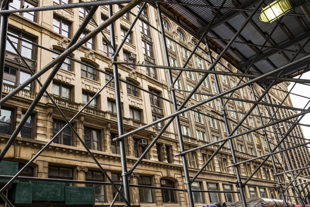 Buildings surrounded by scaffolds in New York